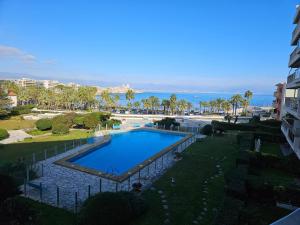 an overhead view of a swimming pool at a resort at Cap d'Antibes Port Aubernon 3P vue Mer Piscine in Antibes