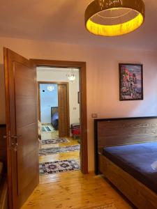 Postel nebo postele na pokoji v ubytování Florija’s Guesthouse