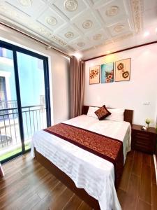 Ένα ή περισσότερα κρεβάτια σε δωμάτιο στο Chuỗi Villa 9 Ngủ Harborbay 5/Tầng Trung tâm Bãi Cháy +7 φωτογραφίες