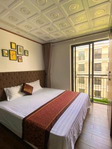 Ένα ή περισσότερα κρεβάτια σε δωμάτιο στο Chuỗi Villa 9 Ngủ Harborbay 5/Tầng Trung tâm Bãi Cháy