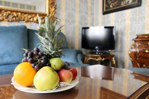 TV a/nebo společenská místnost v ubytování Hotel Palais Porcia