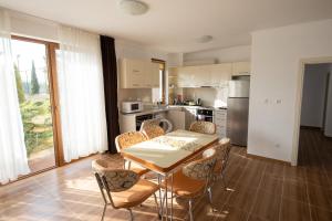 A kitchen or kitchenette at Villas in Complex Trakiyskiy Bryag