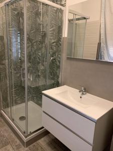 a bathroom with a shower and a sink at My Art home in Salerno