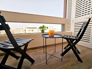 En balkon eller terrasse på Palm Haven Apartment