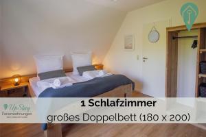 Postel nebo postele na pokoji v ubytování Ferienhaus Max + 8 fotografií