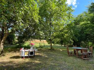 Giardino di La Maison du bonheur - Gîte RULINA - Corancy