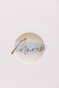 Krąg ze słowem nocross napisanym w nim w obiekcie Marosi Boutique Hotel w mieście Ciutadella