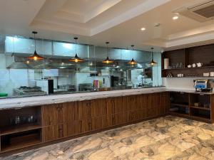 Eldhús eða eldhúskrókur á Dees Boutique Hotel