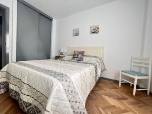 מיטה או מיטות בחדר ב-Öspede Bolboreta Carballo Costa da Morte