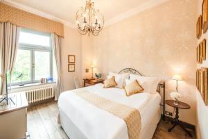 Posteľ alebo postele v izbe v ubytovaní Chateau Mcely