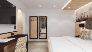 Cama ou camas em um quarto em Hotel Garni Pfeifer