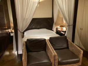 Postel nebo postele na pokoji v ubytování グッドホテル大阪 大人専用 + 22 fotografií