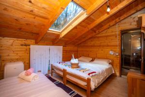 Ein Bett oder Betten in einem Zimmer der Unterkunft Bee Eco Guest House