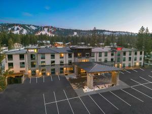 an aerial view of a hotel with a parking lot at Hampton Inn Big Bear Lake in Big Bear Lake