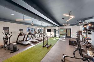 a gym with many treadmills and elliptical machines at Hampton Inn Big Bear Lake in Big Bear Lake