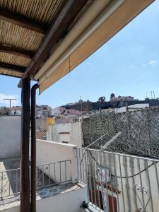 A balcony or terrace at "la casa dell'architetto" con terrazza panoramica in centro storico e a due passi dal porto
