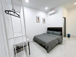 Postel nebo postele na pokoji v ubytování Elonna Homestay