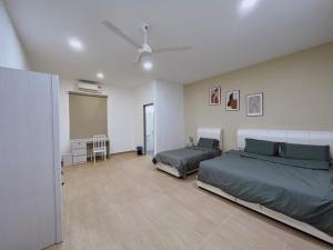 Postel nebo postele na pokoji v ubytování Elonna Homestay