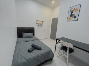Postel nebo postele na pokoji v ubytování Elonna Homestay