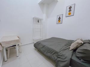 Postel nebo postele na pokoji v ubytování Elonna Homestay