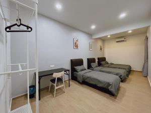 Postel nebo postele na pokoji v ubytování Elonna Homestay