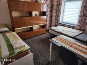 Postel nebo postele na pokoji v ubytování Gasthaus Elbe