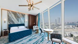 Vuode tai vuoteita majoituspaikassa Velero Hotel Doha Lusail