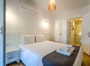 A bed or beds in a room at LONDİA OTEL