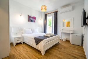 Postel nebo postele na pokoji v ubytování LONDİA OTEL