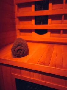 a piece of bread sitting on top of a wooden table at Be-B in Wageningen