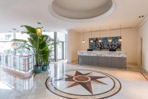 a lobby with a star on the floor at Sesimbra Oceanfront Hotel - Preferred Hotels and Resorts in Sesimbra