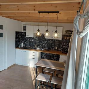 Imagen de la galería de Domek letniskowy Słoneczny Zakątek, en Frombork