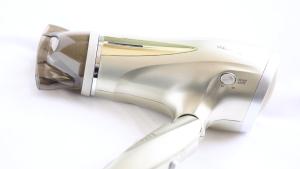 a close up of a stainless steel hair dryer at Onyado Nono Sendai Natural Hot Spring in Sendai