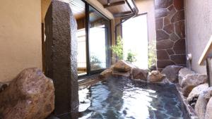 Onyado Nono Sendai Natural Hot Spring في سيندايْ: anaturalificialifi lifelication lifelifi lifelication lifelification