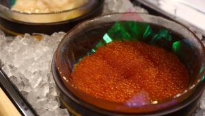 a small bowl filled with red substance in ice at Onyado Nono Sendai Natural Hot Spring in Sendai