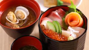 two bowls of food sitting on a table at Onyado Nono Sendai Natural Hot Spring in Sendai