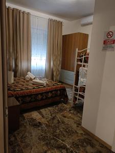 Un pat sau paturi într-o cameră la Domus Cesena