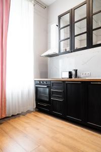 Kuchnia lub aneks kuchenny w obiekcie HOUSEHOST Apartment: Łazarza II street