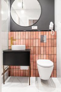 Koupelna v ubytování HOUSEHOST Apartment: Łazarza II street