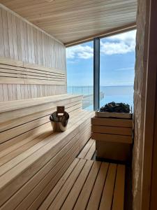 a sauna with a view of the ocean at Sea Star Budva in Budva