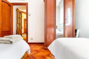Apartamento Centro de Santanderにあるベッド
