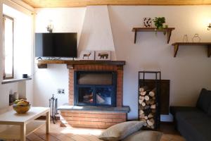 TV a/nebo společenská místnost v ubytování Il Frutteto Natura a Relax