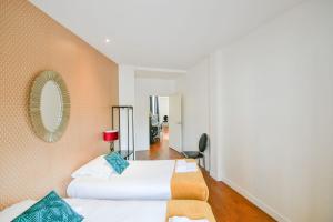 Posteľ alebo postele v izbe v ubytovaní Huge and bright 4BD for 10 guests Sacre-Coeur