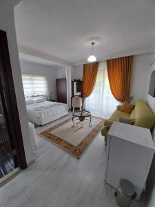Postel nebo postele na pokoji v ubytování Jasmin Apart Otel