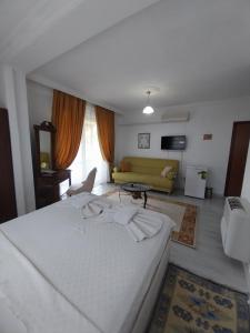 Postel nebo postele na pokoji v ubytování Jasmin Apart Otel