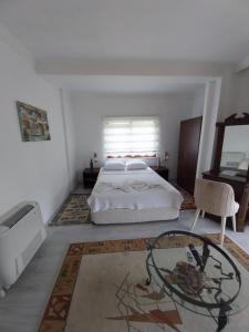 Postel nebo postele na pokoji v ubytování Jasmin Apart Otel