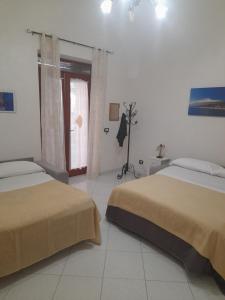 Postel nebo postele na pokoji v ubytování Fior dell'Etna
