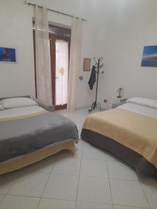 Postel nebo postele na pokoji v ubytování Fior dell'Etna