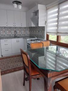 Kuchyň nebo kuchyňský kout v ubytování Jasmin Apart Otel