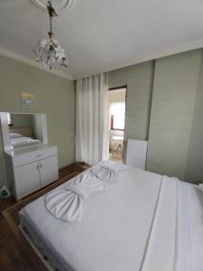Postel nebo postele na pokoji v ubytování Jasmin Apart Otel